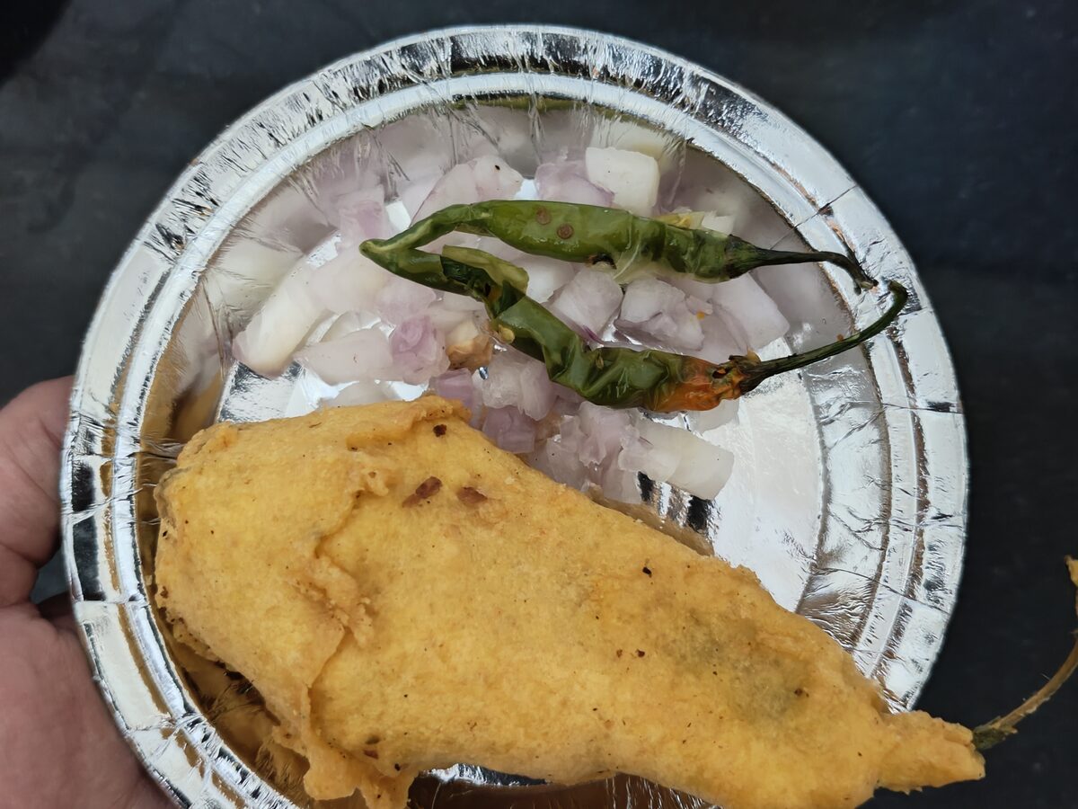 Mirchi Bada — large green chilies stuffed and deep-fried in a spiced gram-flour batter
